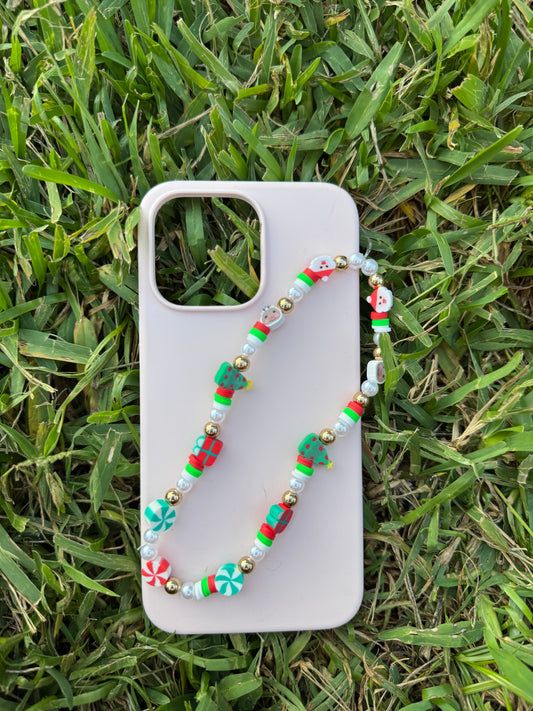 Christmas phone charm white pearls,gold pearls,red beads,green beads,white beads and Christmas charms!
